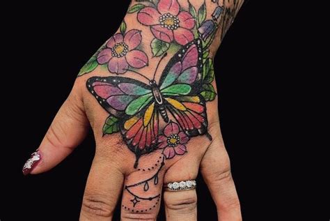 butterfly tattoo on hand|55 Butterfly Hand Tattoo Ideas That Soar